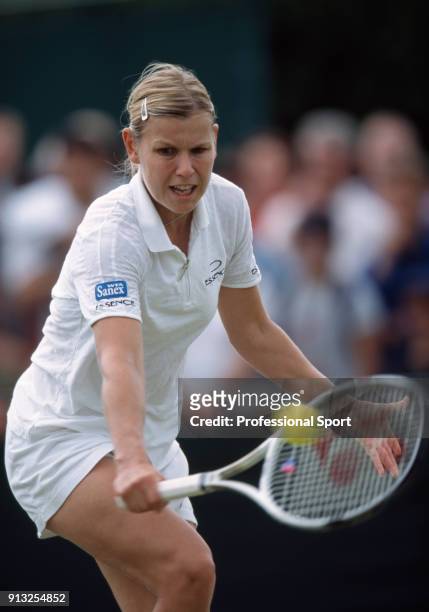 Anke Huber of Germany in action during the Wimbledon Lawn Tennis Championships at the All England Lawn Tennis and Croquet Club, circa June, 2001 in...