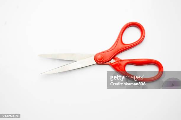 red scissor  sharp on white background - schaar stockfoto's en -beelden