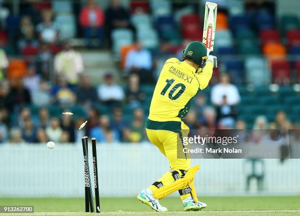 Peter Neville of the PM's XI is bowled during the One Day Tour Match between the Prime Minister's XI and England at Manuka Oval on February 2, 2018...