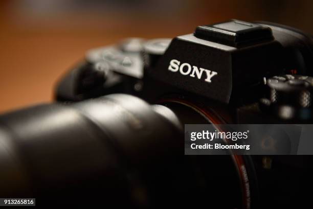Sony Corp. A9 mirrorless digital camera stands on displayed at the company's headquarters in Tokyo, Japan, on Friday, Feb. 2, 2018. Sony announced to...