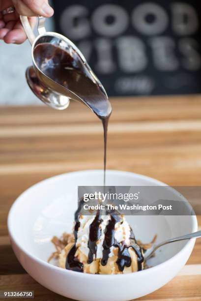 Hot Fudge Sundae - vanilla ice cream with poundcake chunks, whipped cream, pecan brittle and dulce de leche sauce with hot fudge at R Family Kitchen...