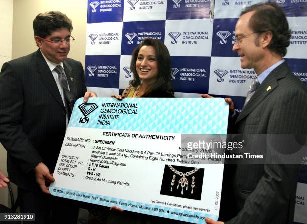 Actress Tisca Chopra , Roland Lorie, CEO International Gemological Institute and Tehmasp Printer, Managing Director of IGI India, during the...