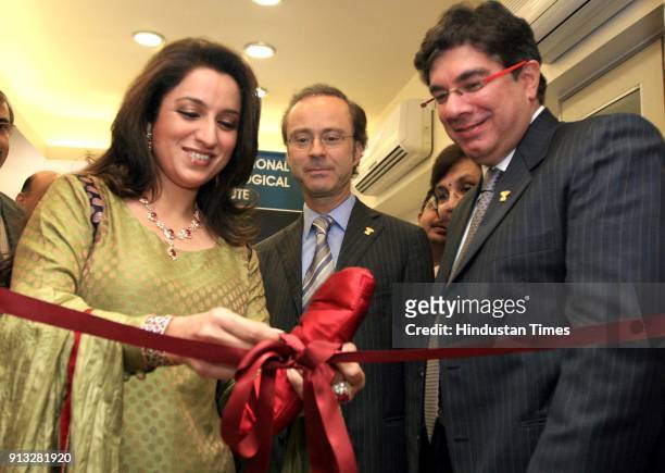Actress Tisca Chopra , Roland Lorie, CEO of International Gemological Institute and Tehmasp Printer, Managing Director of IGI India inaugurating the...