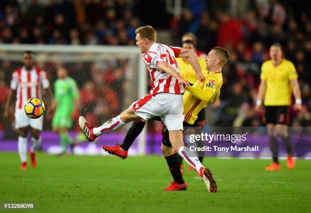 Darren Fletcher of Stoke City tackles Gerard Deulofeu of Watford during the Premier League match between Stoke City and Watford at Bet365 Stadium on...