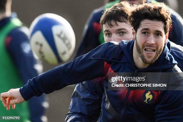 French XV de France scrumhalf Maxime Machenaud takes part in the captain run in Marcoussis on February 2, 2018 on the eve of the Six Nations rugby...