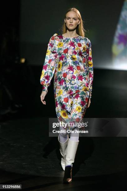 Model walks the runway at the Baum und Pferdgarten show during the Copenhagen Fashion Week Autumn/Winter18 on February 1, 2018 in Copenhagen, Denmark.