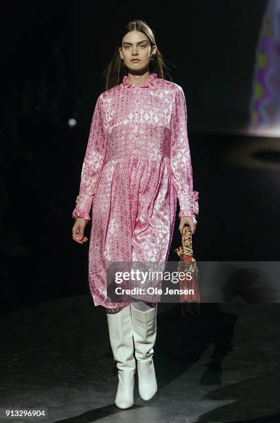 Model walks the runway at the Baum und Pferdgarten show during the Copenhagen Fashion Week Autumn/Winter18 on February 1, 2018 in Copenhagen, Denmark.