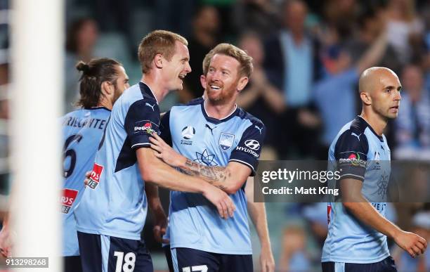 David Carney of Sydney FC celebrates with team mates after scoring a goal during the round 19 A-League match between Sydney FC and the Wellington...