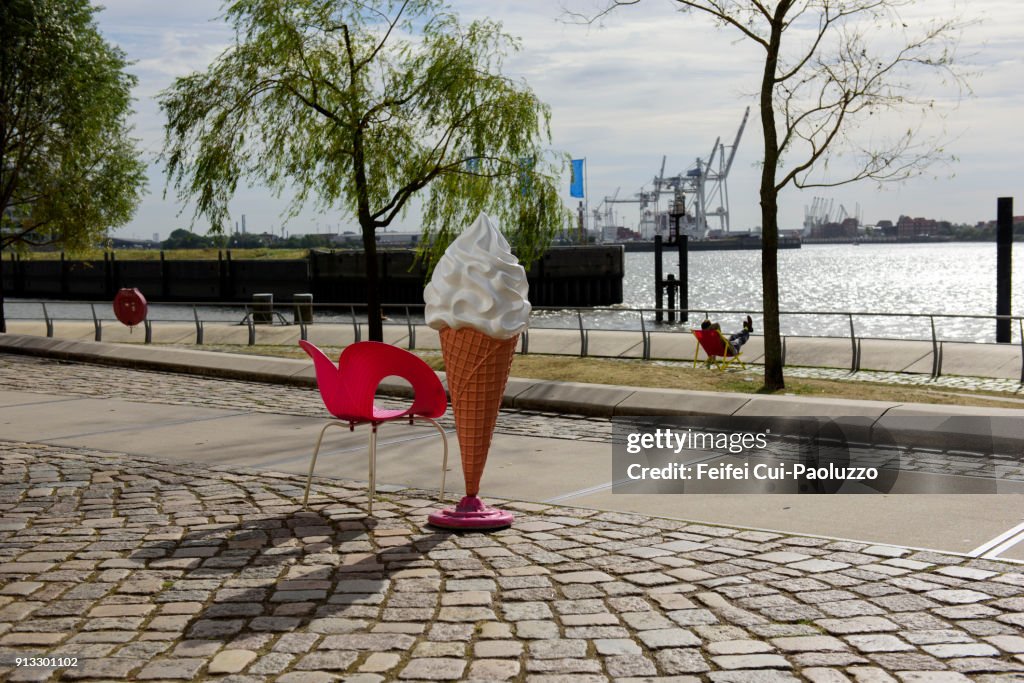 A red chair and an Ice cream cone model at Hamburg, Germany