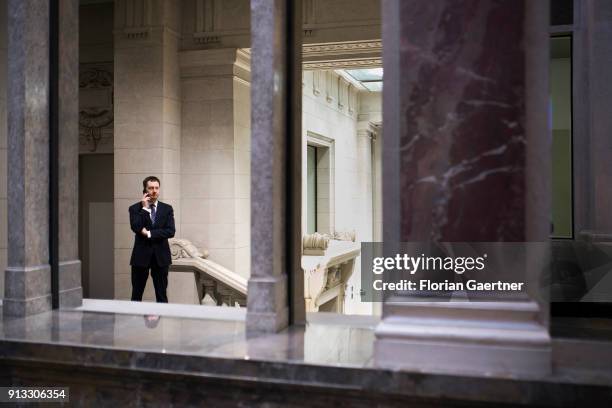 Michael Kretschmer, prime minister of the German State of Saxony, phones at the Bundesrat on February 02, 2018 in Berlin, Germany.