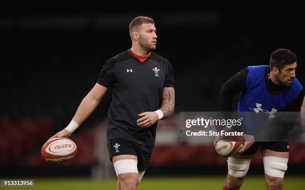 Wales player Ross Moriarty and Justin Tipuric in action during the captain's run ahead of their opening Six Nations match against Scotland at...