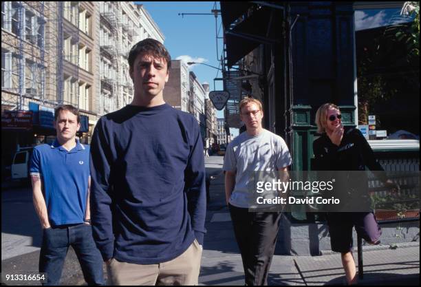 Foo Fighters, group portrait on West Broadway, New York 18 September 1999. L-R Chris Shiflett, Dave Grohl, Nate Mendel, Taylor Hawkins.