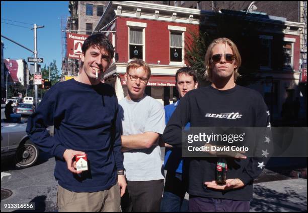Foo Fighters, group portrait on West Broadway, New York 18 September 1999. L-R Dave Grohl, Nate Mendel, Chris Shiflett, Taylor Hawkins.