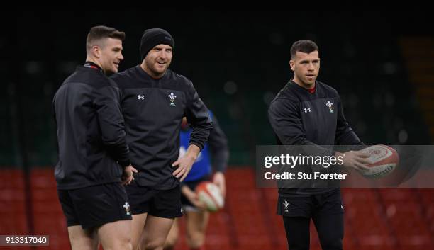 Wales Scarlets players from left Scott Williams, Hadleigh Parkes and Gareth Davies share a joke during the captain's run ahead of their opening Six...