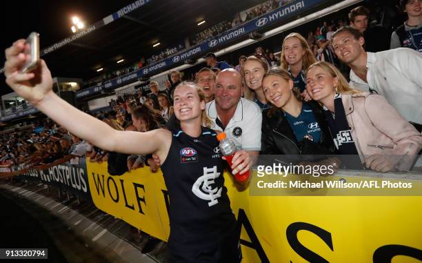 Breann Moody of the Blues celebrates with her family during the 2018 AFLW Round 01 match between the Carlton Blues and the Collingwood Magpies at...