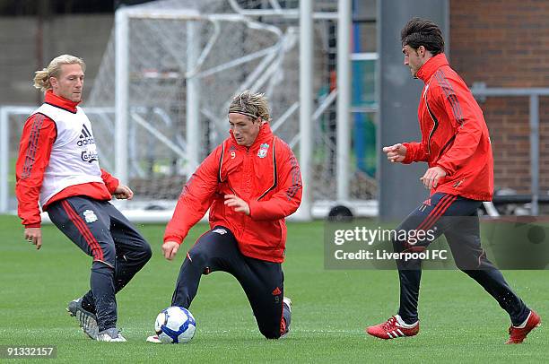 Fernando Torres with Andriy Voronin and Albert Riera during a Liverpool Training session at Melwood on October 2, 2009 in Liverpool, England.