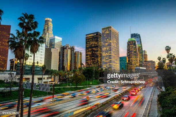 traffic in downtown los angeles, california - los angeles stock pictures, royalty-free photos & images