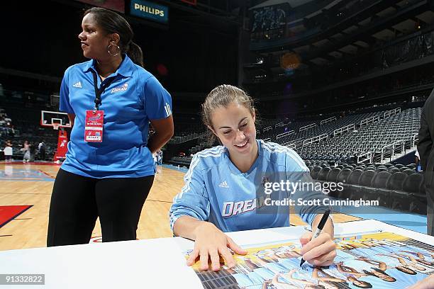 Shalee Lehning of the Atlanta Dream signs autographs for fans prior to the WNBA game against the Connecticut Sun on September 11, 2009 at Philips...