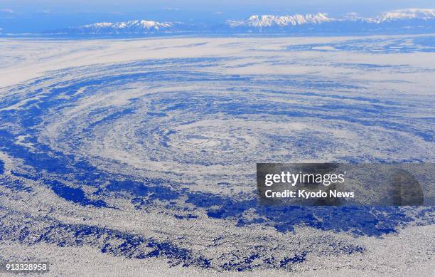 Photo taken from a Kyodo News airplane shows drift ice whirling around in the Sea of Okhotsk off Abashiri on Japan's northernmost main island of...