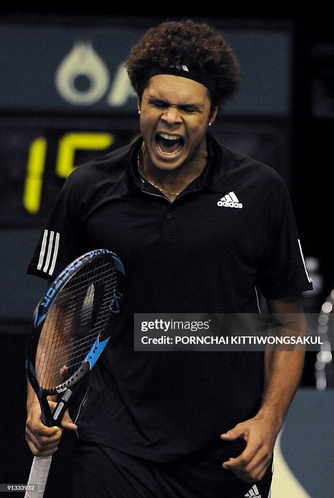 Jo-Wilfried Tsonga of France reacts to M