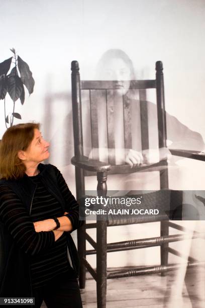 Photographer Susan Meiselas poses in front one of her pictures during the preparation of her exhibition at the Jeu de Paume museum on February 2 in...