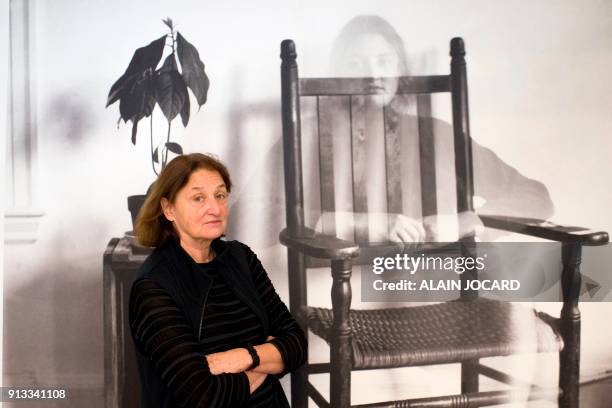 Photographer Susan Meiselas poses in front one of her pictures during the preparation of her exhibition at the Jeu de Paume museum on February 2 in...