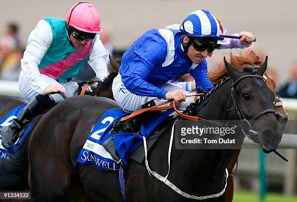 Richard Hills rides Awzaan to win The Shadwell Middle Park Stakes at Newmarket Racecourse on October 2, 2009 in Newmarket, England.