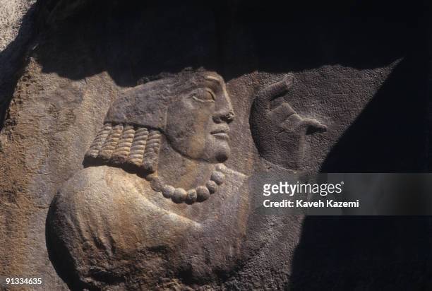 Relief carving of the Zoroastrian high priest Kartir Hangirpe on the eastern wall surrounding the Ka'ba-ye Zartosht, or 'Cube of Zoroaster' at...
