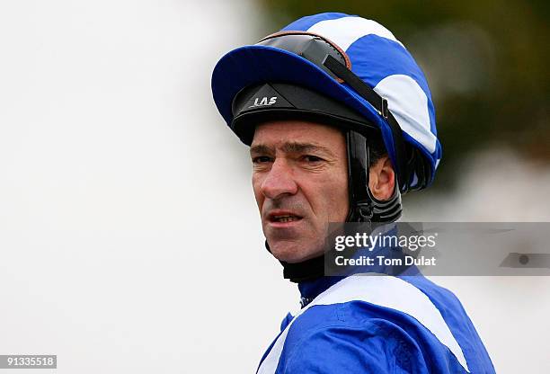 Richard Hills riding Awzaan looks on after winning The Shadwell Middle Park Stakes at Newmarket Racecourse on October 2, 2009 in Newmarket, England.