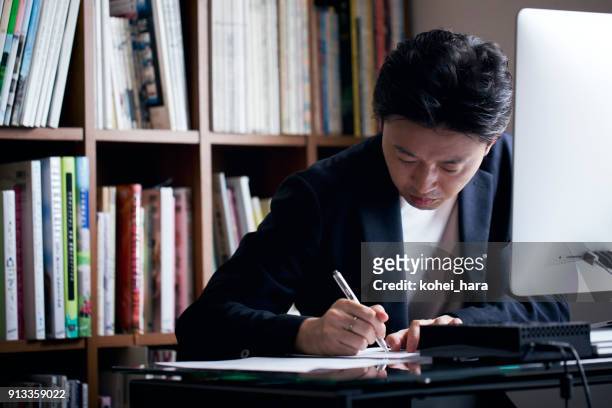 business man working from home - escritura japonesa imagens e fotografias de stock