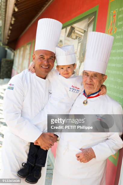 D'OR, FRANCE The chef Paul Bocuse is photographed for Paris Match in his restaurant Le Pont de Collonge au Mont d'Or with his son Jerome Bocuse and...