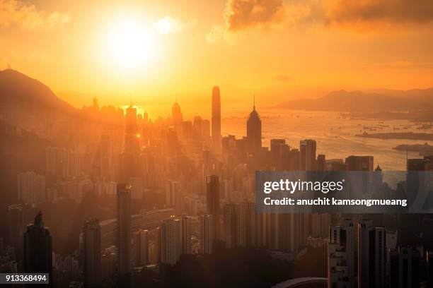orange city - hong kong sunrise stock pictures, royalty-free photos & images