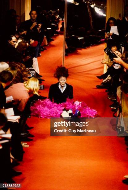 Naomi Campbell sitting on the runway and laughing after having fallen in the Vivienne Westwood Fall 1993 RTW show. Naomi Campbell;