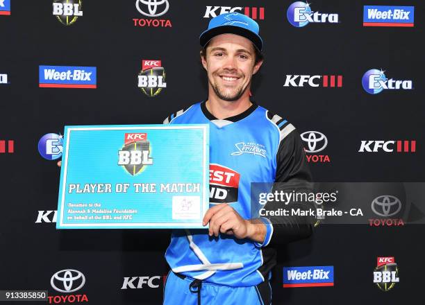 Man of the Match Travis Head of the Adelaide Strikers during the Big Bash League match between the Adelaide Strikers and the Melbourne Renegades at...