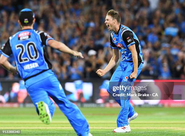 Ben Laughlin of the Adelaide Strikers celebrates after bowling the last ball to win during the Big Bash League match between the Adelaide Strikers...