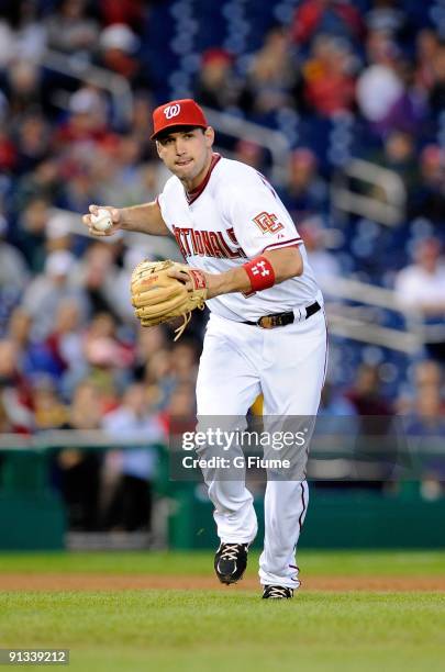 Ryan Zimmerman of the Washington Nationals throws the ball to first base against the New York Mets at Nationals Park on September 30, 2009 in...