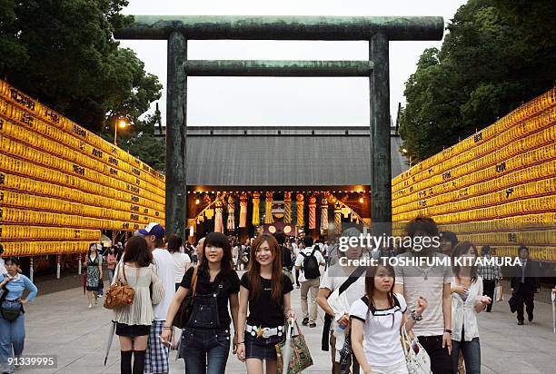 People visits the Yasukuni shrine during the "Mitama" festival at the Yasukuni shrine in Tokyo, 13 July 2007. Japanese Prime Minister Shinzo Abe...