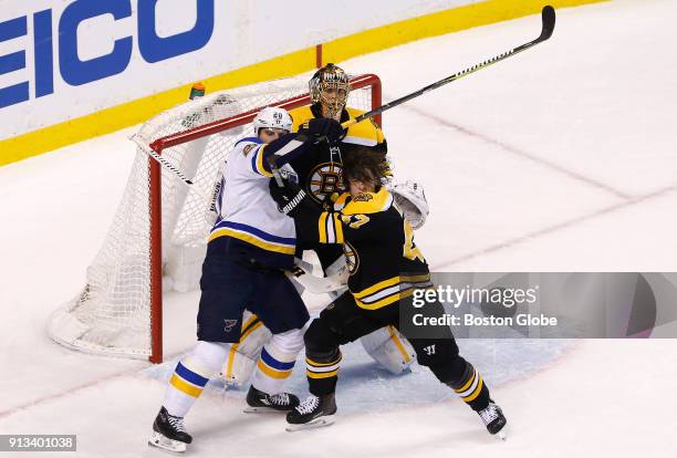 Boston Bruins' Torey Krug battles against St. Louis Blues' Alexander Steen in front of the net during the first period. The Boston Bruins host the...