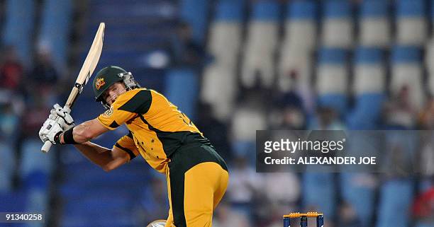 Australian batsman Shane Watson looks back to see if he is safe from the delivery of unseen England cricketer James Anderson during The ICC Champions...