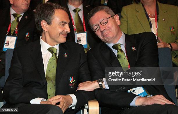 Spain's Prime Minister Jose Luis Zapatero is consoled by Madrid Mayor Alberto Ruiz Gallardon after Rio De Janeiro won the vote to stage the 2016...