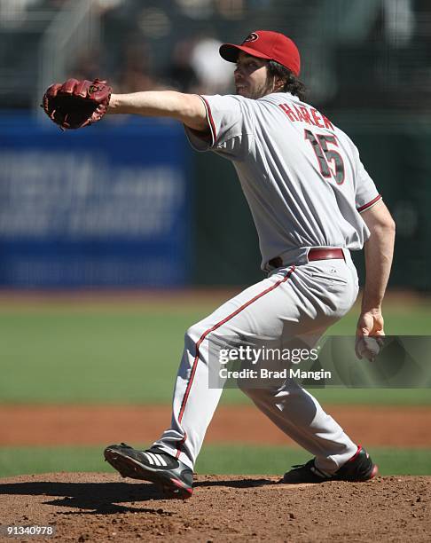 Dan Haren of the Arizona Diamondbacks pitches against the San Francisco Giants during the game at AT&T Park on October 1, 2009 in San Francisco,...