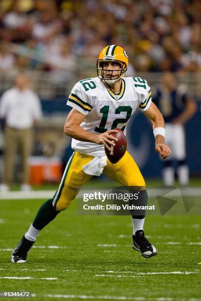 Aaron Rodgers of the Green Bay Packers looks for a receiver during the game against the St. Louis Rams at the Edward Jones Dome on September 27, 2009...