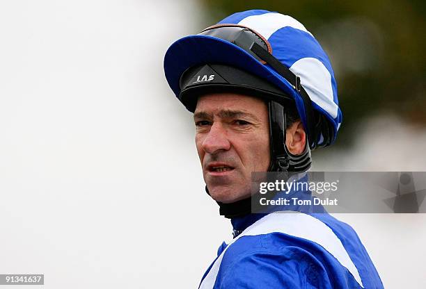 Richard Hills riding Awzaan looks on after winning The Shadwell Middle Park Stakes at Newmarket Racecourse on October 2, 2009 in Newmarket, England.