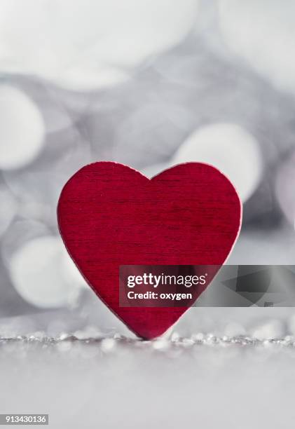 heart shape with bokeh background for valentines day - fahrradlampe stock-fotos und bilder