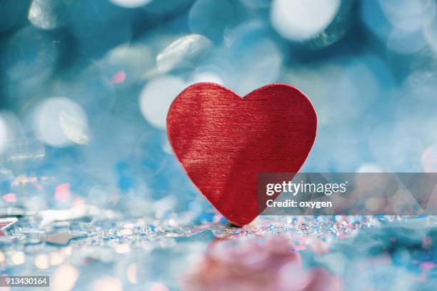 heart shape with bokeh background for valentines day - fahrradlampe stock-fotos und bilder