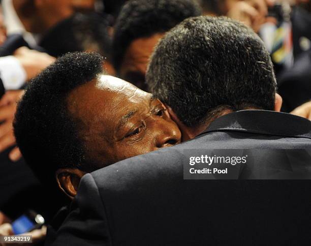 Pele hugs is given a hug as members and supporters of the Rio Olympic bid celebrate winning the vote to host the 2016 Olympic Games on October 2,...