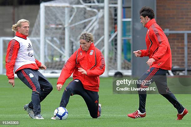 Fernando Torres with Andriy Voronin and Albert Riera during a Liverpool Training session at Melwood on October 2, 2009 in Liverpool, England.