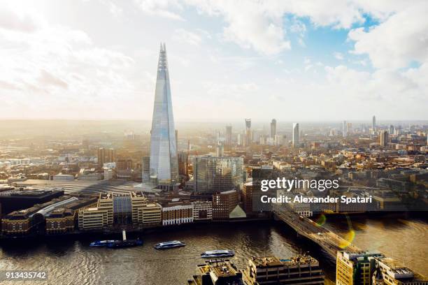 aerial helicopter view of london with the shard building, london, england, uk - aerial view london stock-fotos und bilder