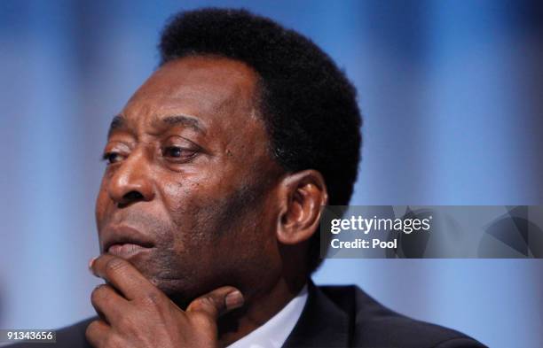 Brazilian soccer legend Pele, who accompanied President Luiz Inacio Lula da Silva, listens during questioning at the Rio de Janeiro 2016 bid...