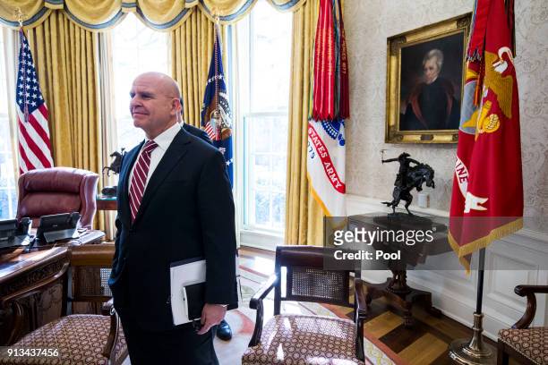 McMaster, national security advisor, listens as U.S. President Donald Trump meets with North Korean defectors in the Oval Office of the White House...